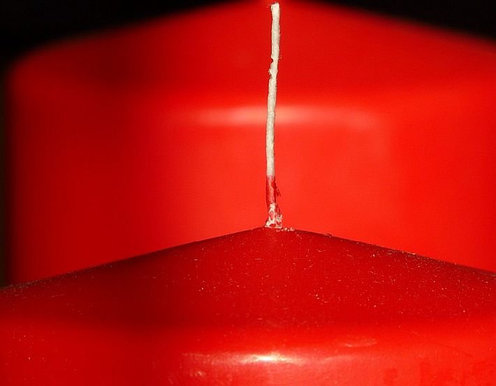 Always make sure to trim the wick of a candle to a proper length.