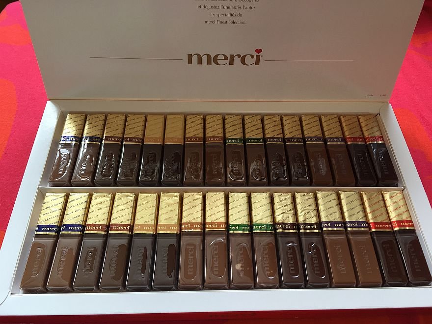 Here are all the Merci chocolate flavors in a box of 32 (four of each taste)