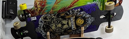 Picture of two cut out longboards.